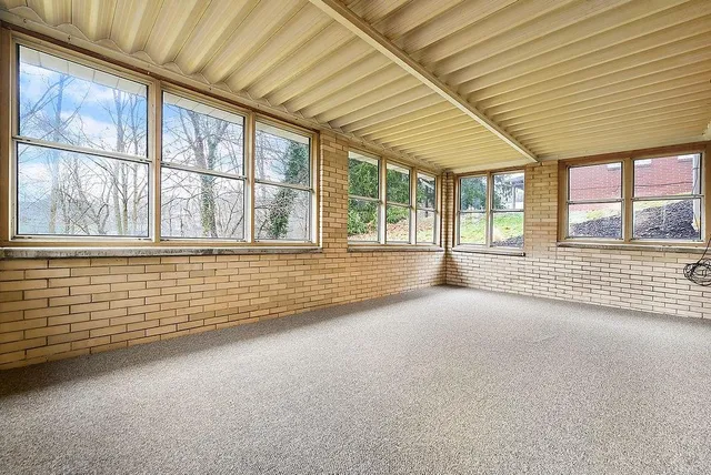 an empty room with windows