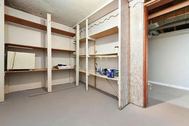 a view of a room with shelves