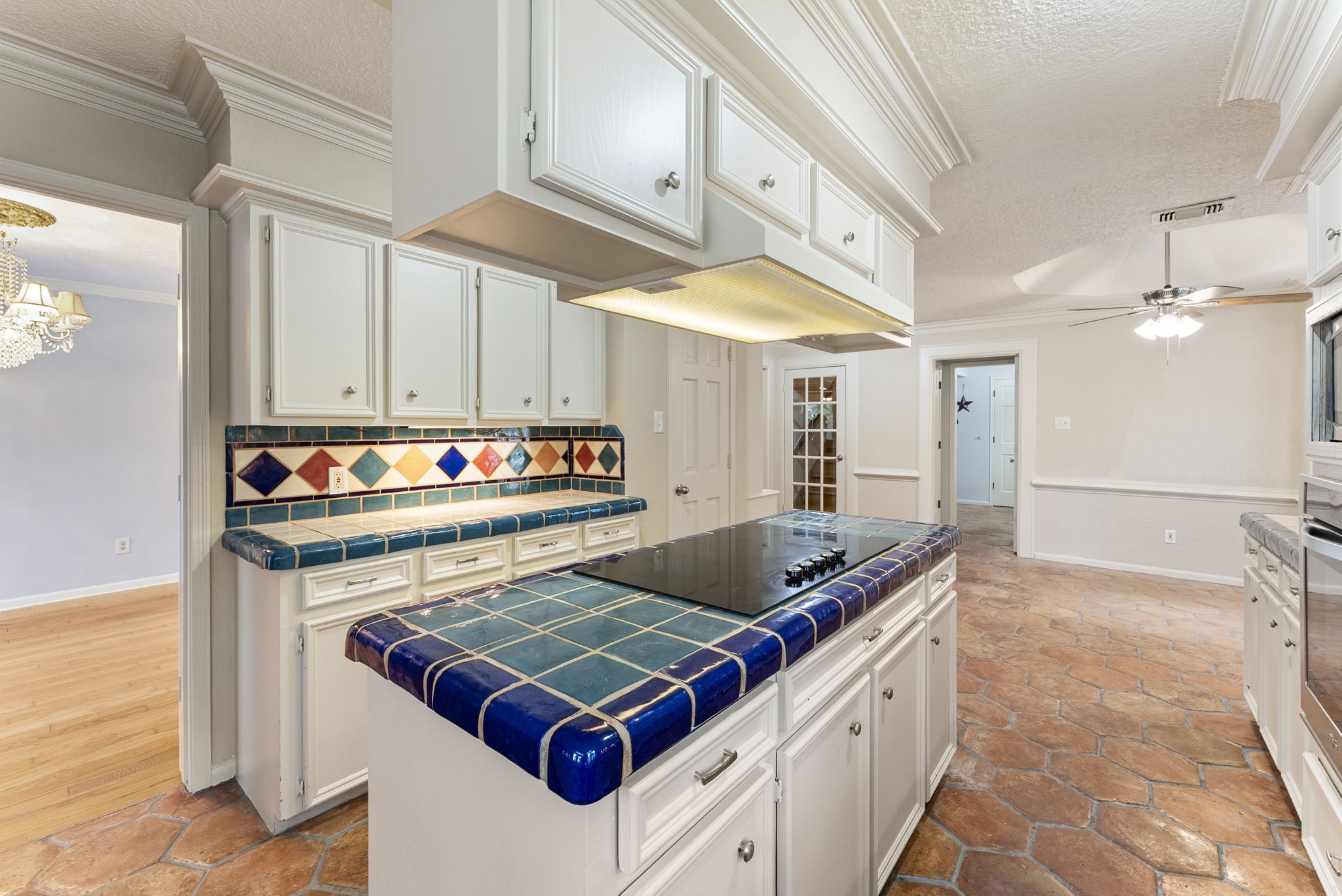 5718 Glenmere Lane Spring, TX 77379 - Photo 10 of 40 a kitchen with stainless steel appliances granite countertop a stove and a sink