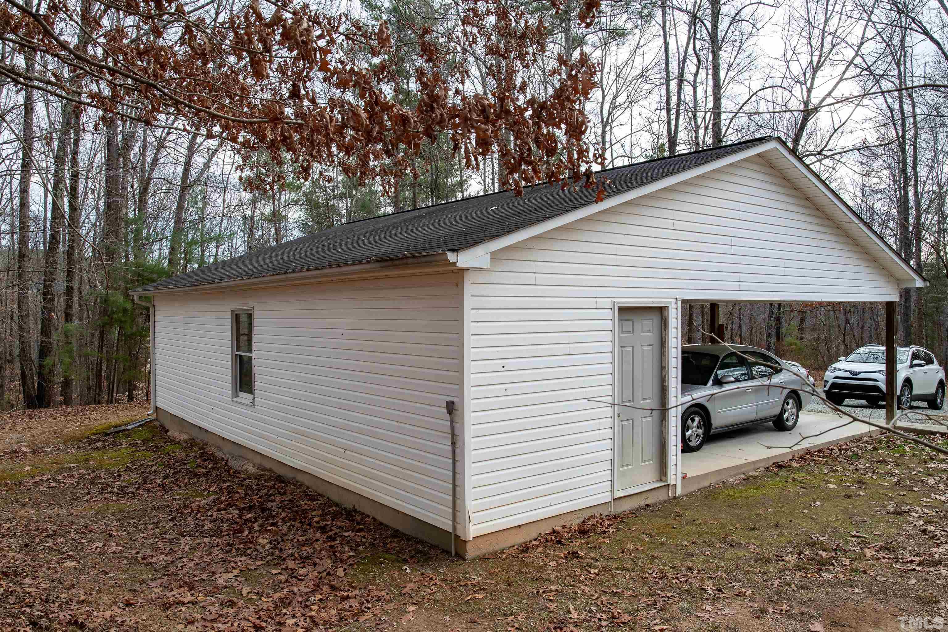 914 Stoney Mountain Road Rougemont, NC 27572 - Photo 12 of 19 a view of a car park in front of house
