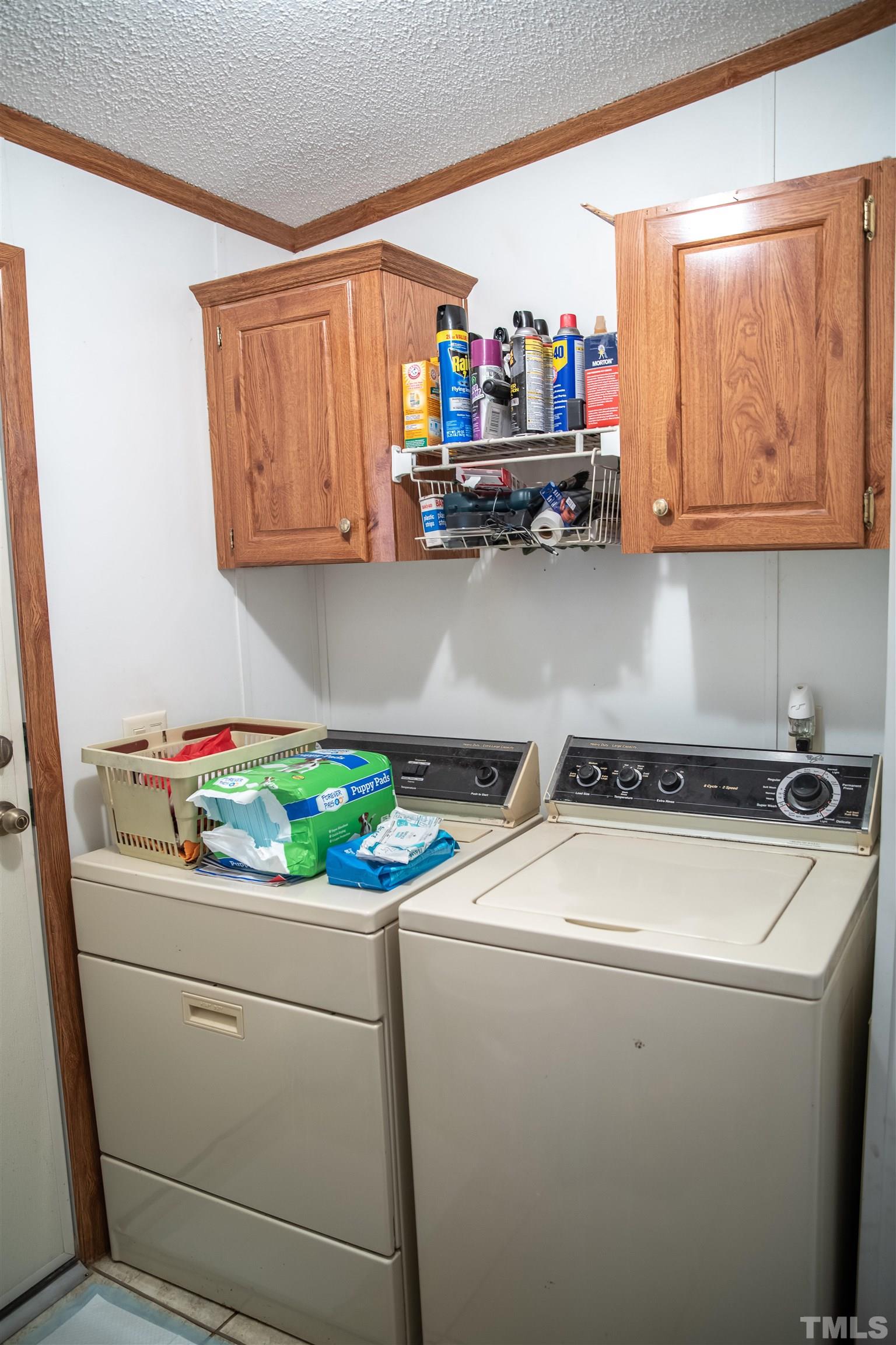 914 Stoney Mountain Road Rougemont, NC 27572 - Photo 8 of 19 a utility room with dryer and washer