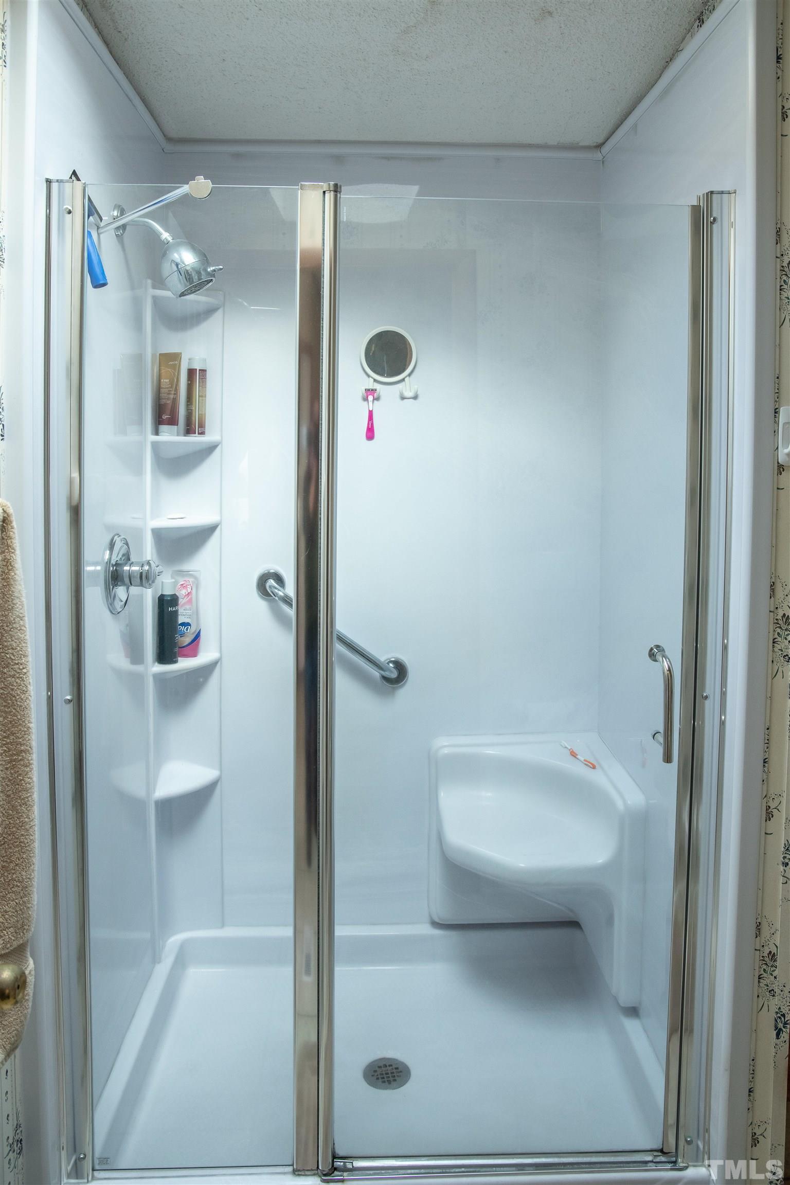 914 Stoney Mountain Road Rougemont, NC 27572 - Photo 9 of 19 a bathroom with a toilet and a shower