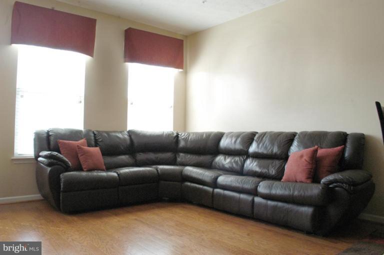 9823 Davison Road Middle River, MD 21220 - Photo 15 of 22 a living room with a couch