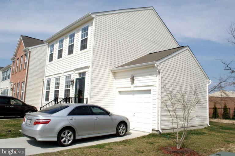 9823 Davison Road Middle River, MD 21220 - Photo 19 of 22 a car parked in front of a house