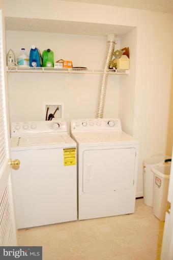 9823 Davison Road Middle River, MD 21220 - Photo 6 of 22 a utility room with dryer and washer