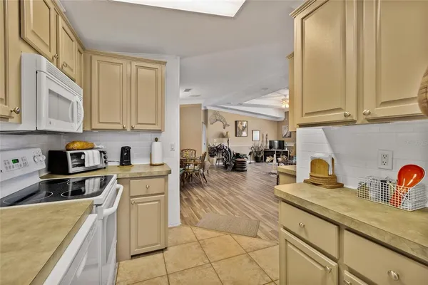 a very nice looking room with lots of furniture and a wooden floor