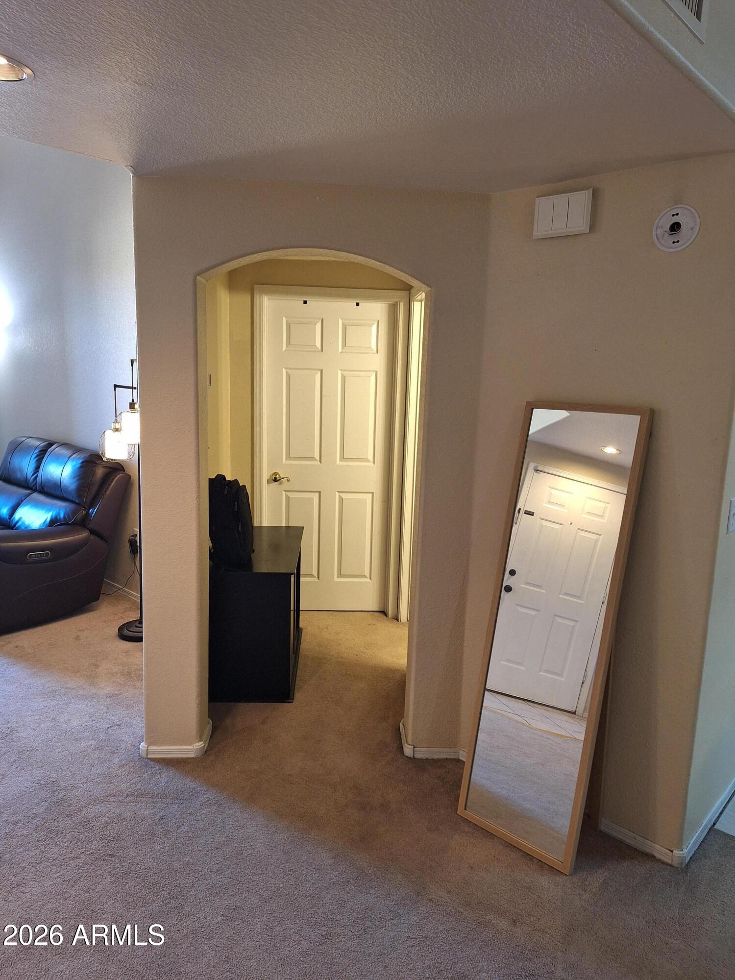 10410 North Cave Creek Road, Unit 2063 Phoenix, AZ 85020 - Photo 26 of 49 a view of a livingroom with furniture and windows