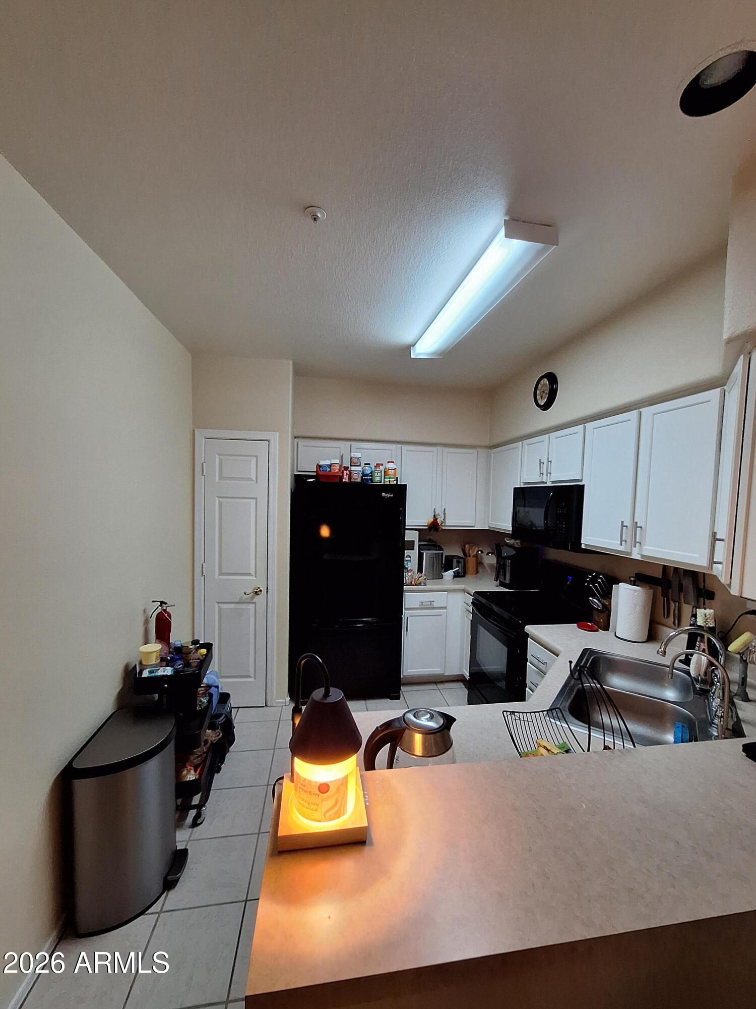 10410 North Cave Creek Road, Unit 2063 Phoenix, AZ 85020 - Photo 33 of 49 a living room with furniture