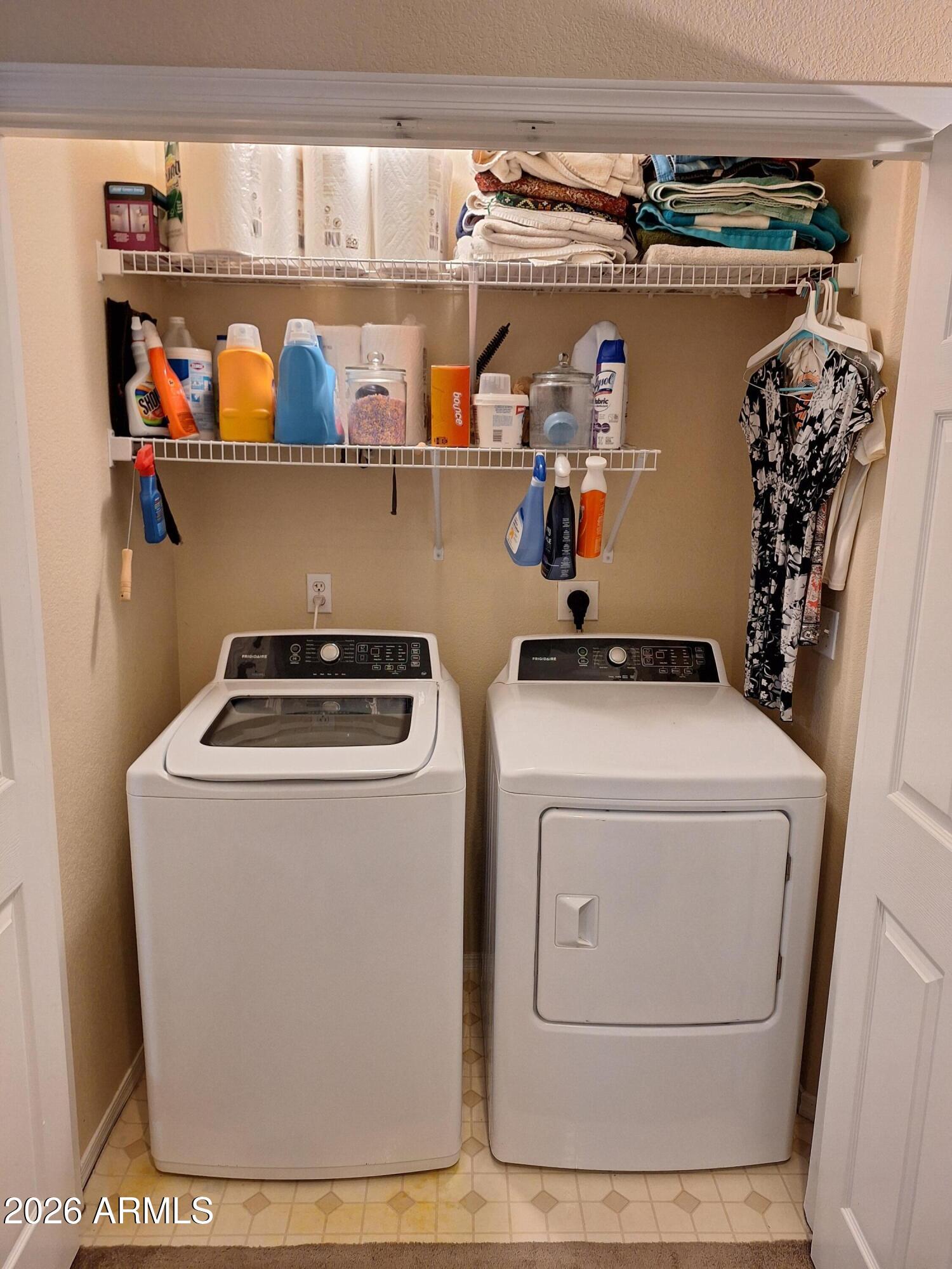 10410 North Cave Creek Road, Unit 2063 Phoenix, AZ 85020 - Photo 48 of 49 a utility room with dryer and washer
