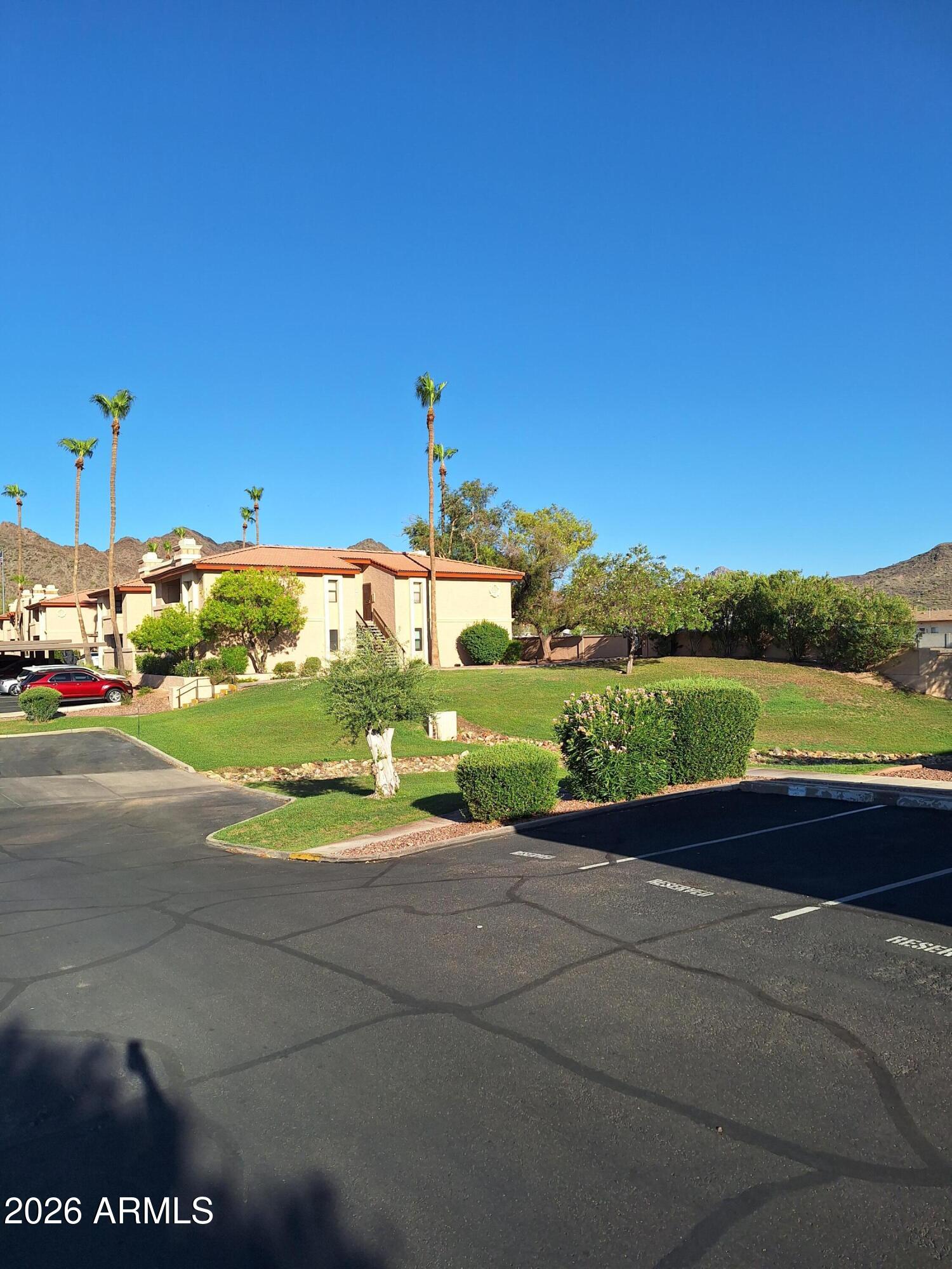 10410 North Cave Creek Road, Unit 2063 Phoenix, AZ 85020 - Photo 6 of 49 a view of a lake with a big yard