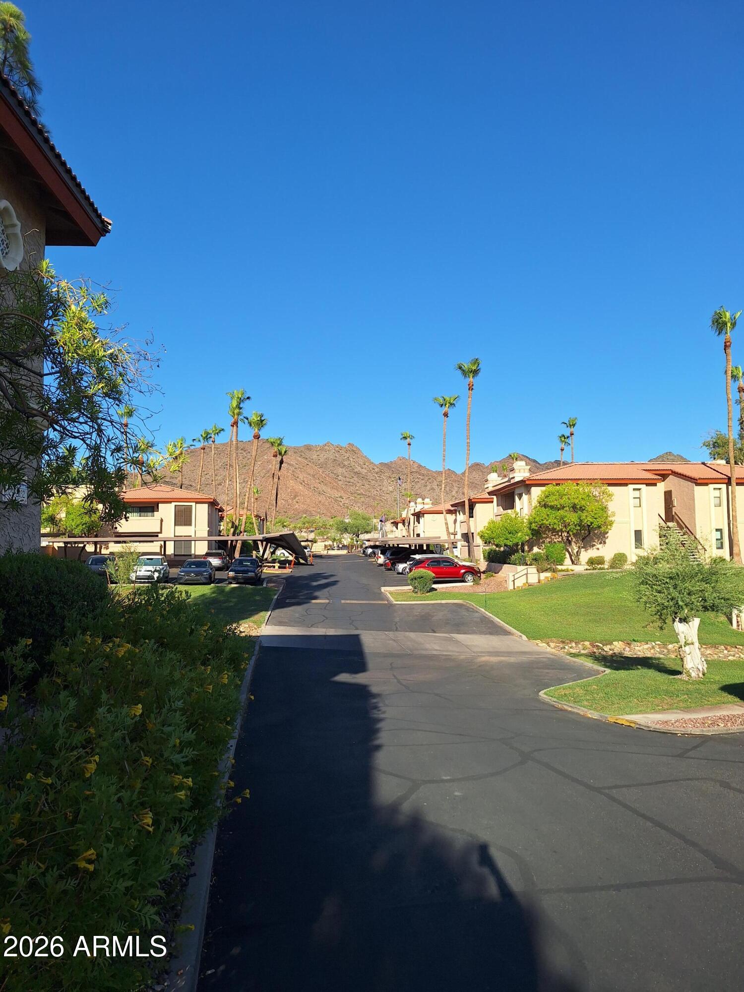 10410 North Cave Creek Road, Unit 2063 Phoenix, AZ 85020 - Photo 7 of 49 a view of a street with an ocean view