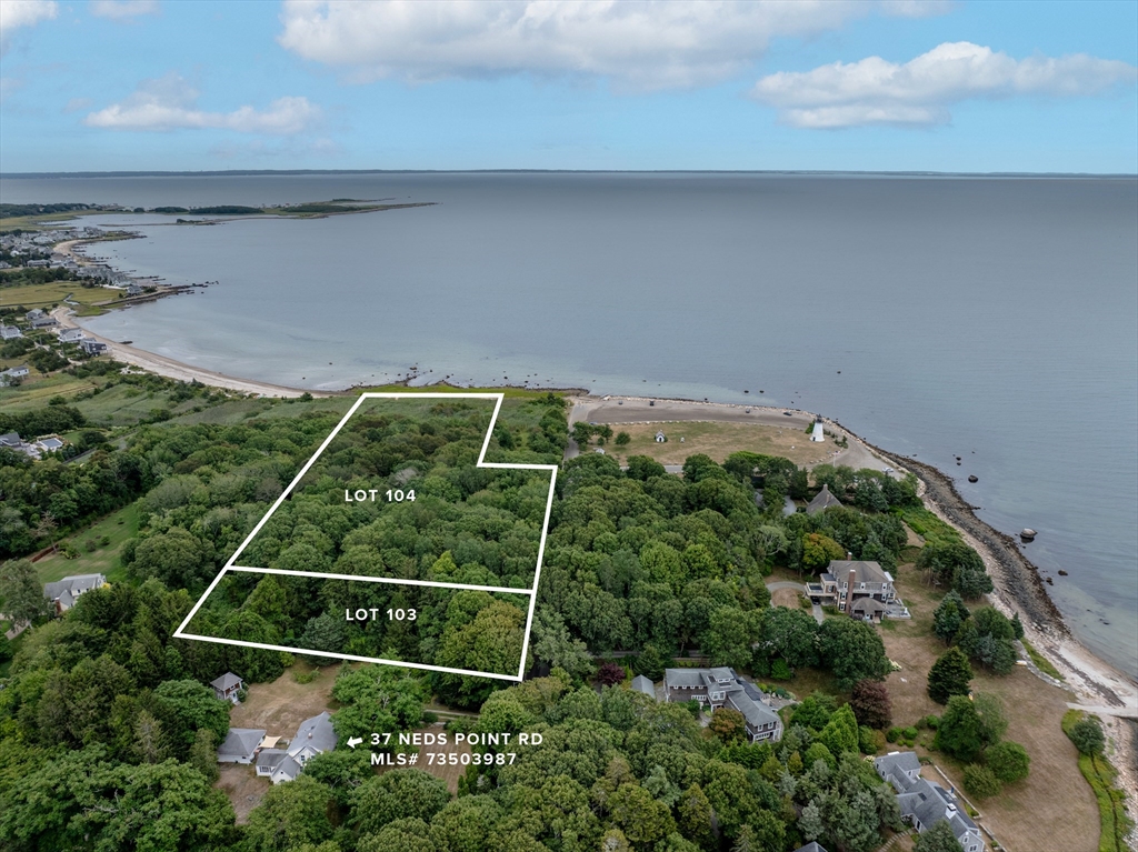 0 Ned's Point Road Mattapoisett, MA 02739 - Photo 5 of 11 a backyard of a house with lots of green space