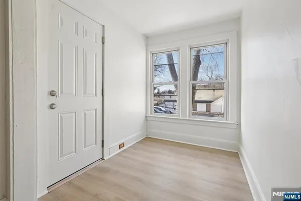 an empty room with windows