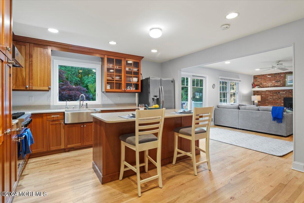 676 Locust Point Road Atlantic Highlands, NJ 07716 - Photo 15 of 56 a view of a dining room with furniture window and wooden floor