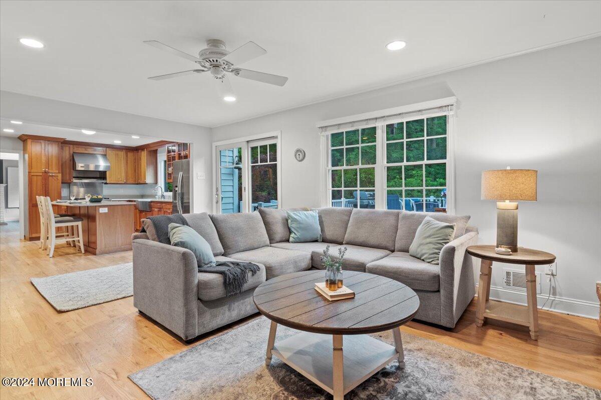 676 Locust Point Road Atlantic Highlands, NJ 07716 - Photo 2 of 56 a living room with furniture and a large window