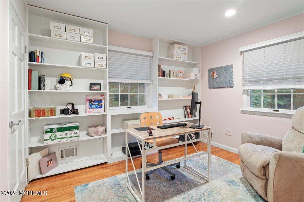 676 Locust Point Road Atlantic Highlands, NJ 07716 - Photo 27 of 56 a living room with furniture and a window