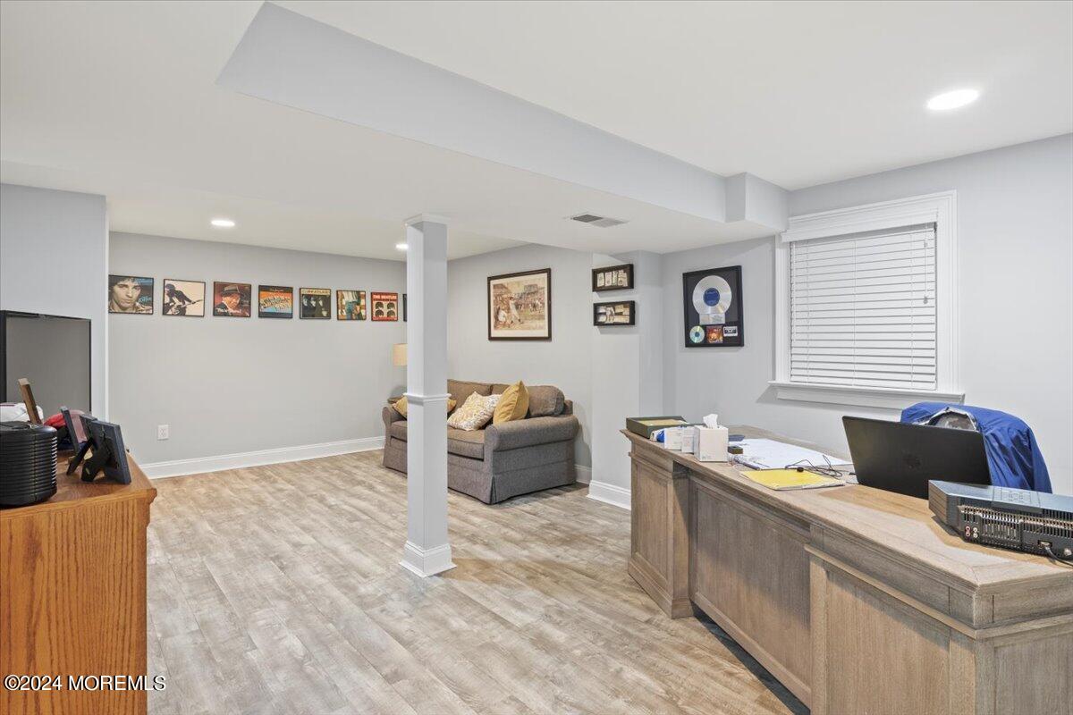 676 Locust Point Road Atlantic Highlands, NJ 07716 - Photo 31 of 56 a living room with furniture and a window