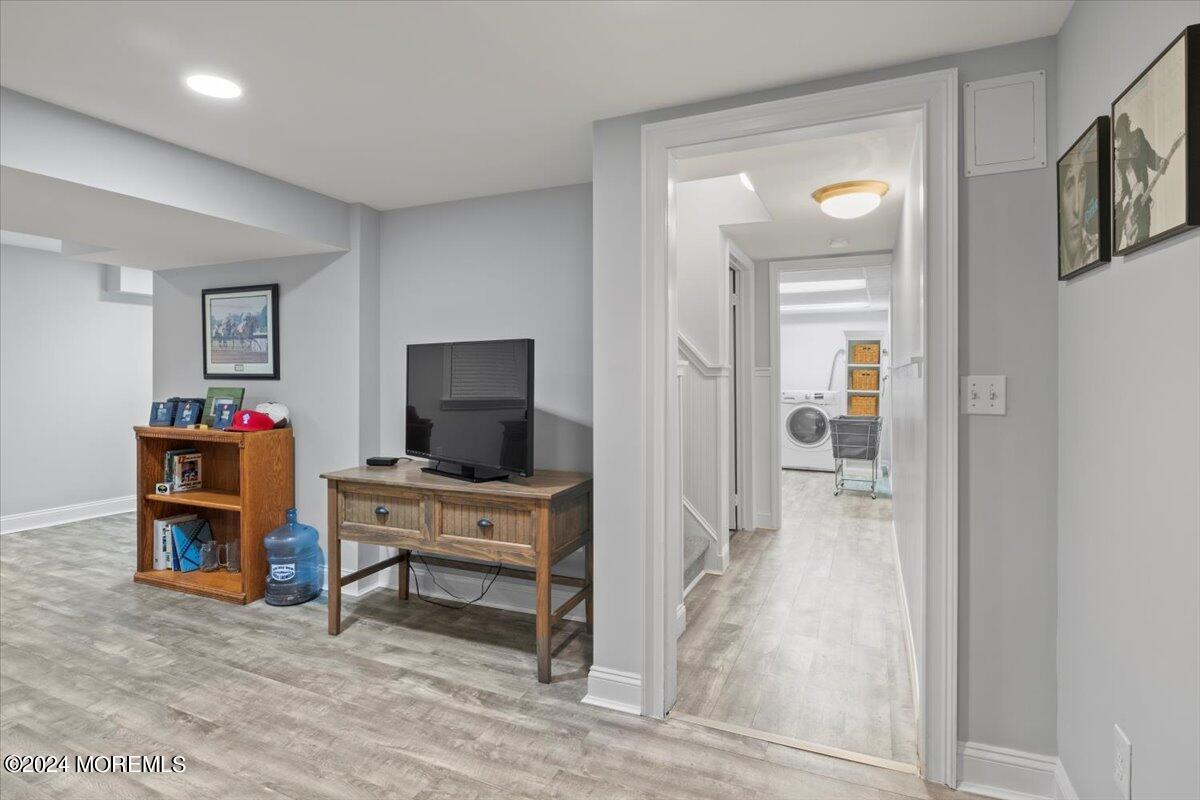 676 Locust Point Road Atlantic Highlands, NJ 07716 - Photo 33 of 56 a workspace with furniture and mirror