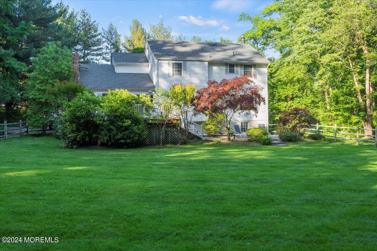 676 Locust Point Road Atlantic Highlands, NJ 07716 - Photo 45 of 56 a front view of a house with garden