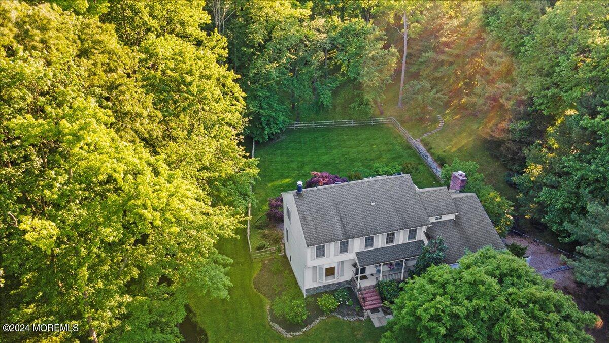676 Locust Point Road Atlantic Highlands, NJ 07716 - Photo 49 of 56 an aerial view of a house with a yard