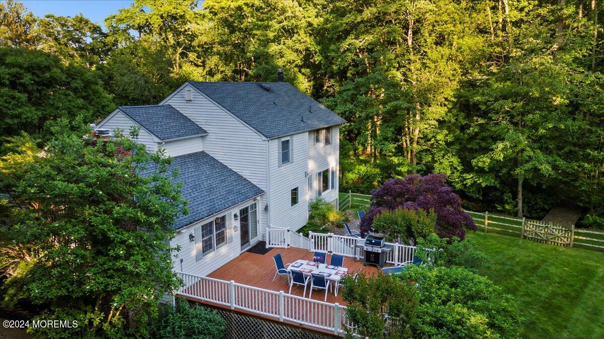 676 Locust Point Road Atlantic Highlands, NJ 07716 - Photo 52 of 56 an aerial view of a house with swimming pool and garden