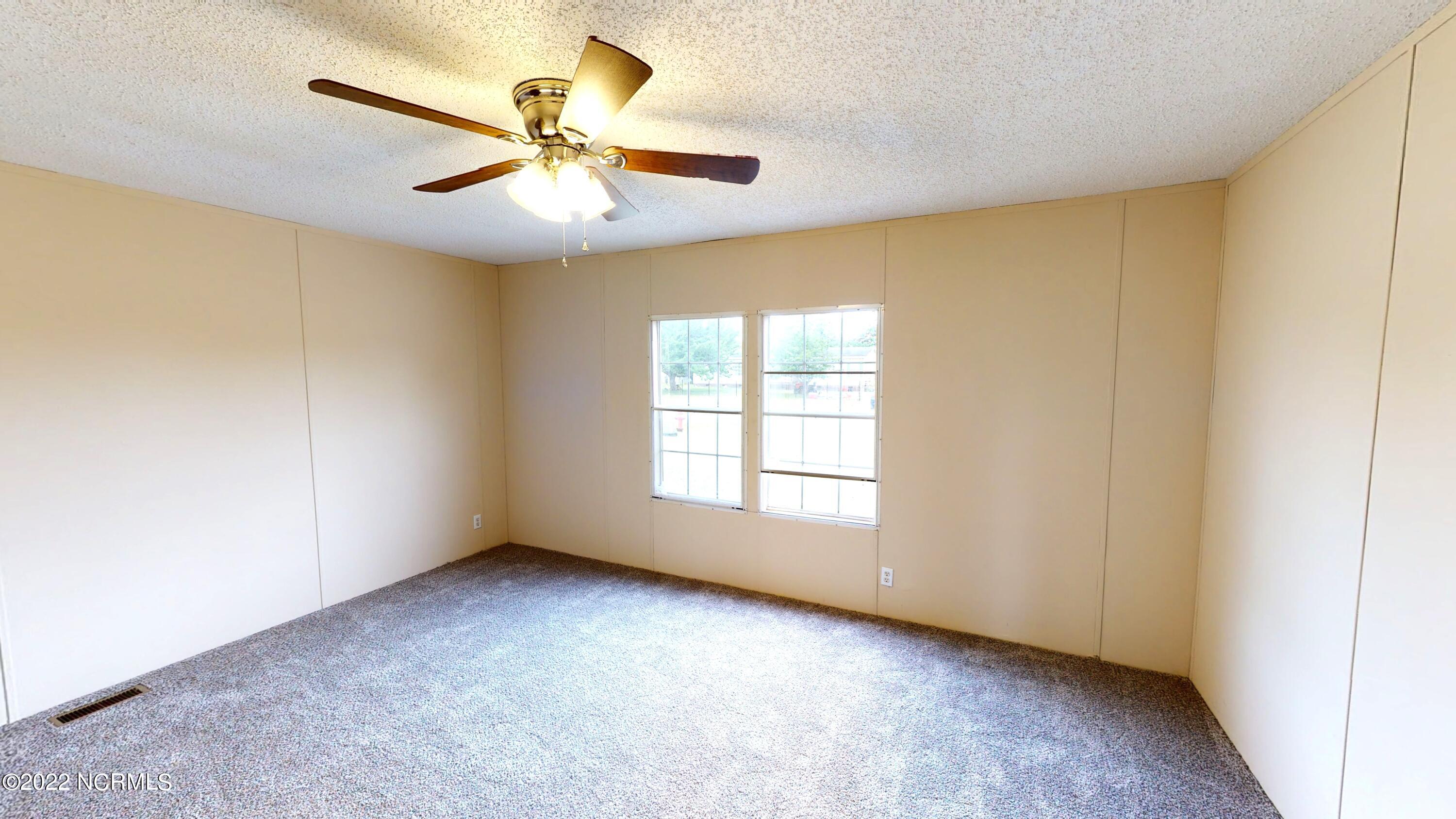 100 Ram's Place Mount Olive, NC 28365 - Photo 10 of 20 11 Primary Bedroom