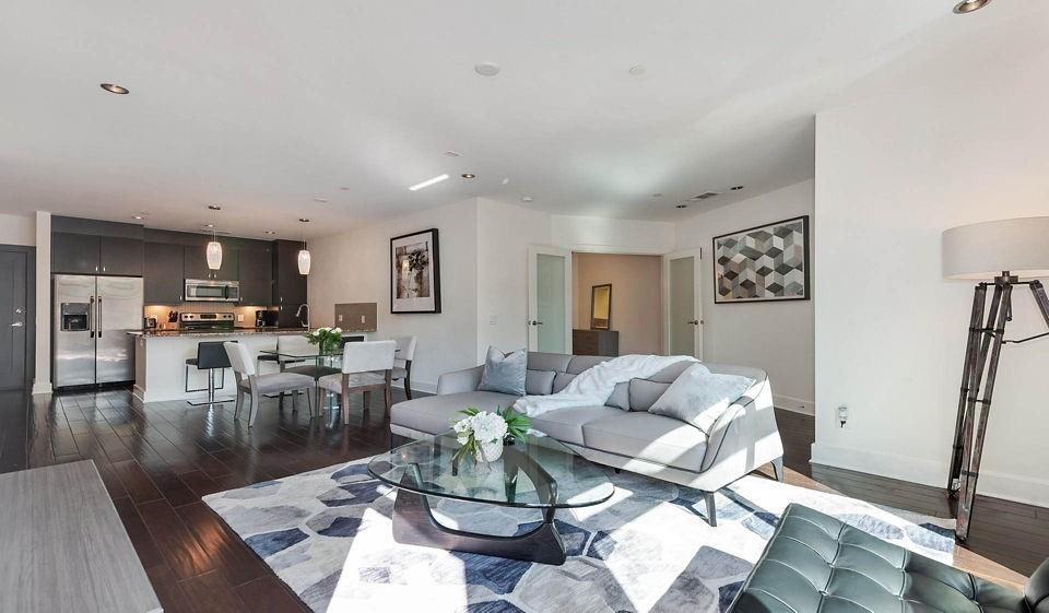 1045 Piedmont Avenue Northeast, Unit 2B2BA Atlanta, GA 30309 - Photo 5 of 16 a living room with furniture and wooden floor