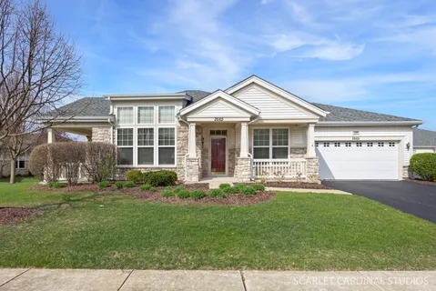 front view of a house with a yard