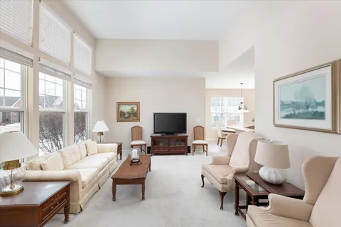 a living room with furniture or couch and a flat screen tv