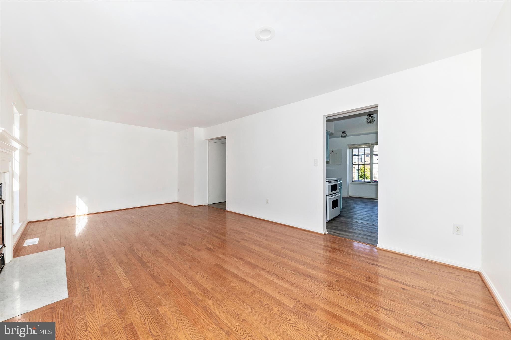 13303 Country Ridge Drive Germantown, MD 20874 - Photo 13 of 45 a view of an empty room and wooden floor