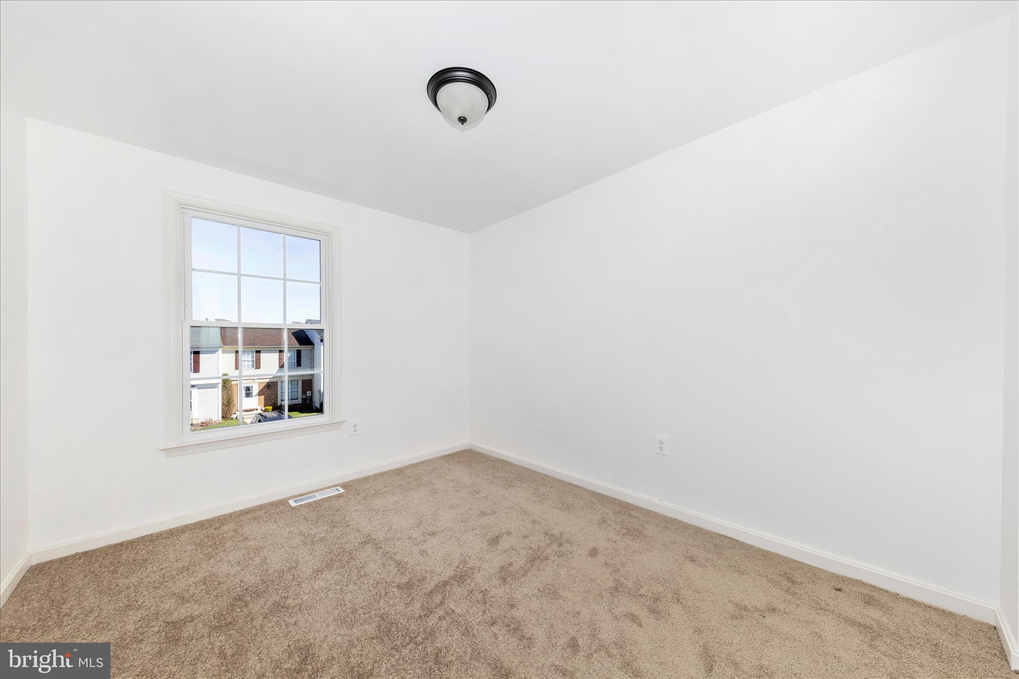 13303 Country Ridge Drive Germantown, MD 20874 - Photo 24 of 45 a view of a window in a room