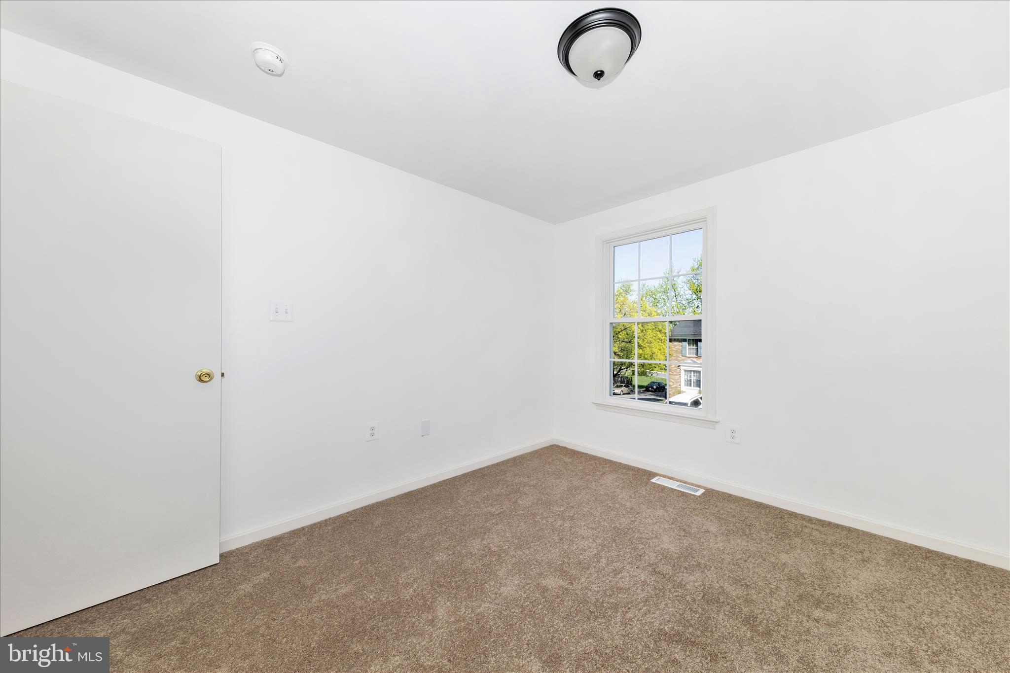 13303 Country Ridge Drive Germantown, MD 20874 - Photo 25 of 45 a view of room with window and hardwood floor