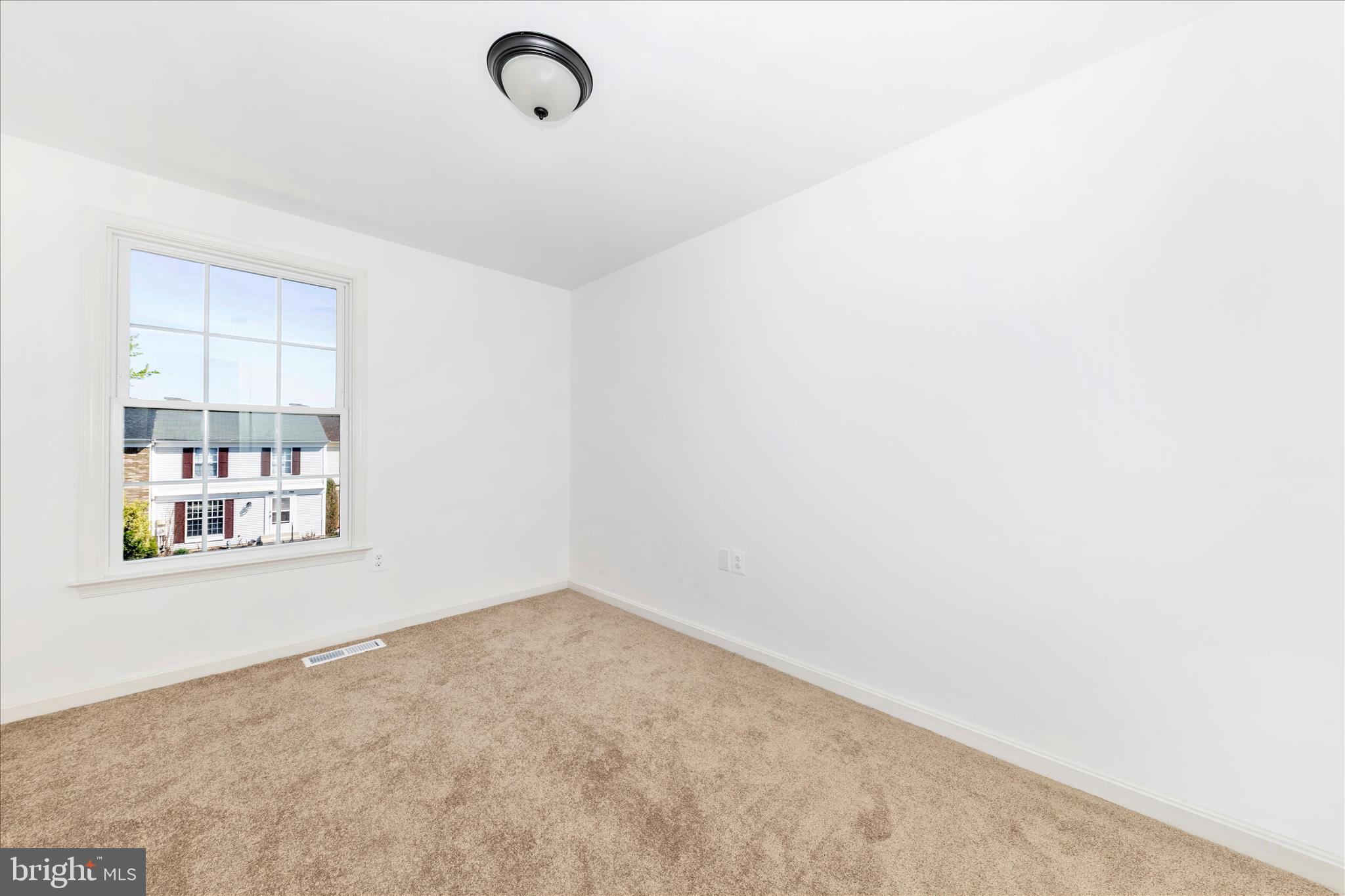 13303 Country Ridge Drive Germantown, MD 20874 - Photo 28 of 45 a view of a room that has a window in it