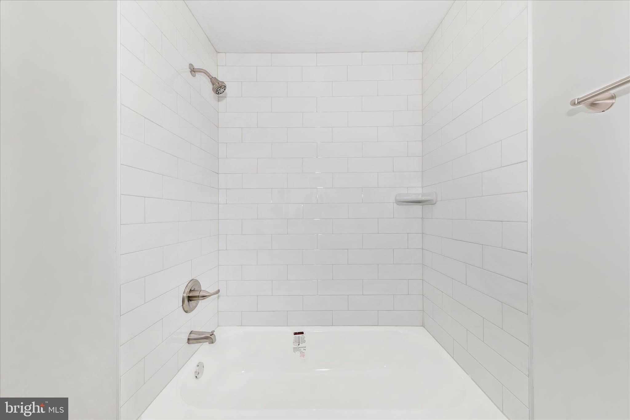 13303 Country Ridge Drive Germantown, MD 20874 - Photo 33 of 45 a bathroom with a bathtub
