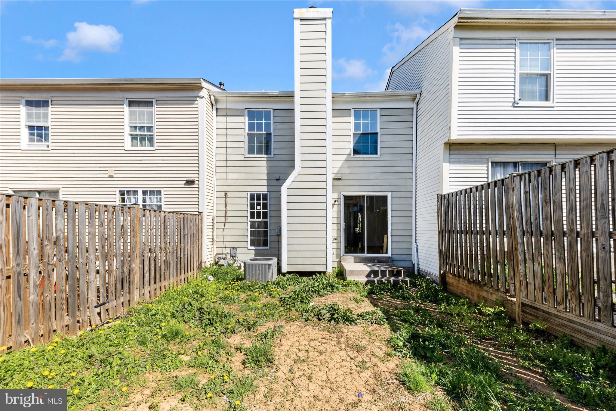 13303 Country Ridge Drive Germantown, MD 20874 - Photo 38 of 45 a front view of a house with a garden