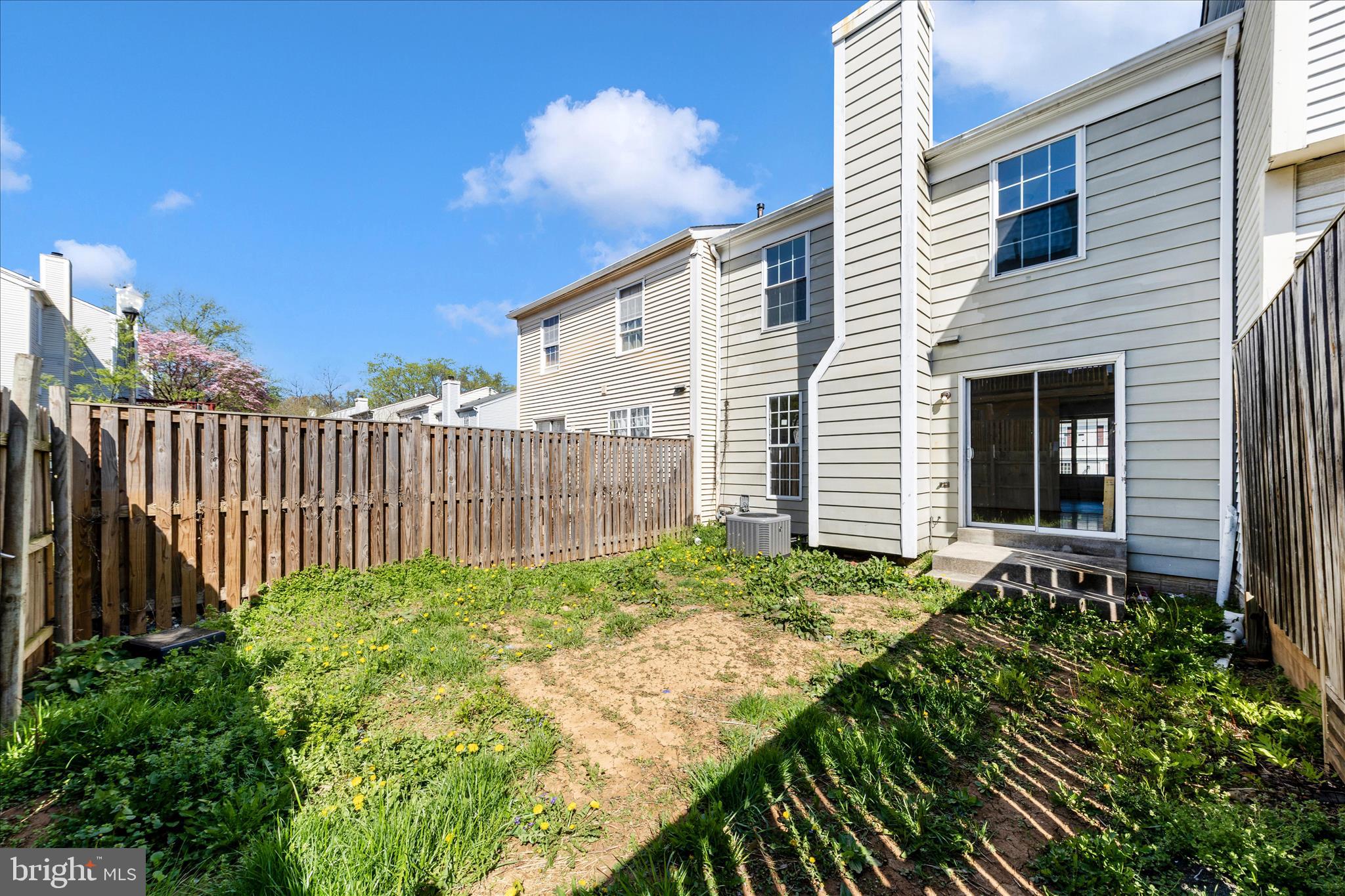 13303 Country Ridge Drive Germantown, MD 20874 - Photo 42 of 45 a view of a backyard with pathway