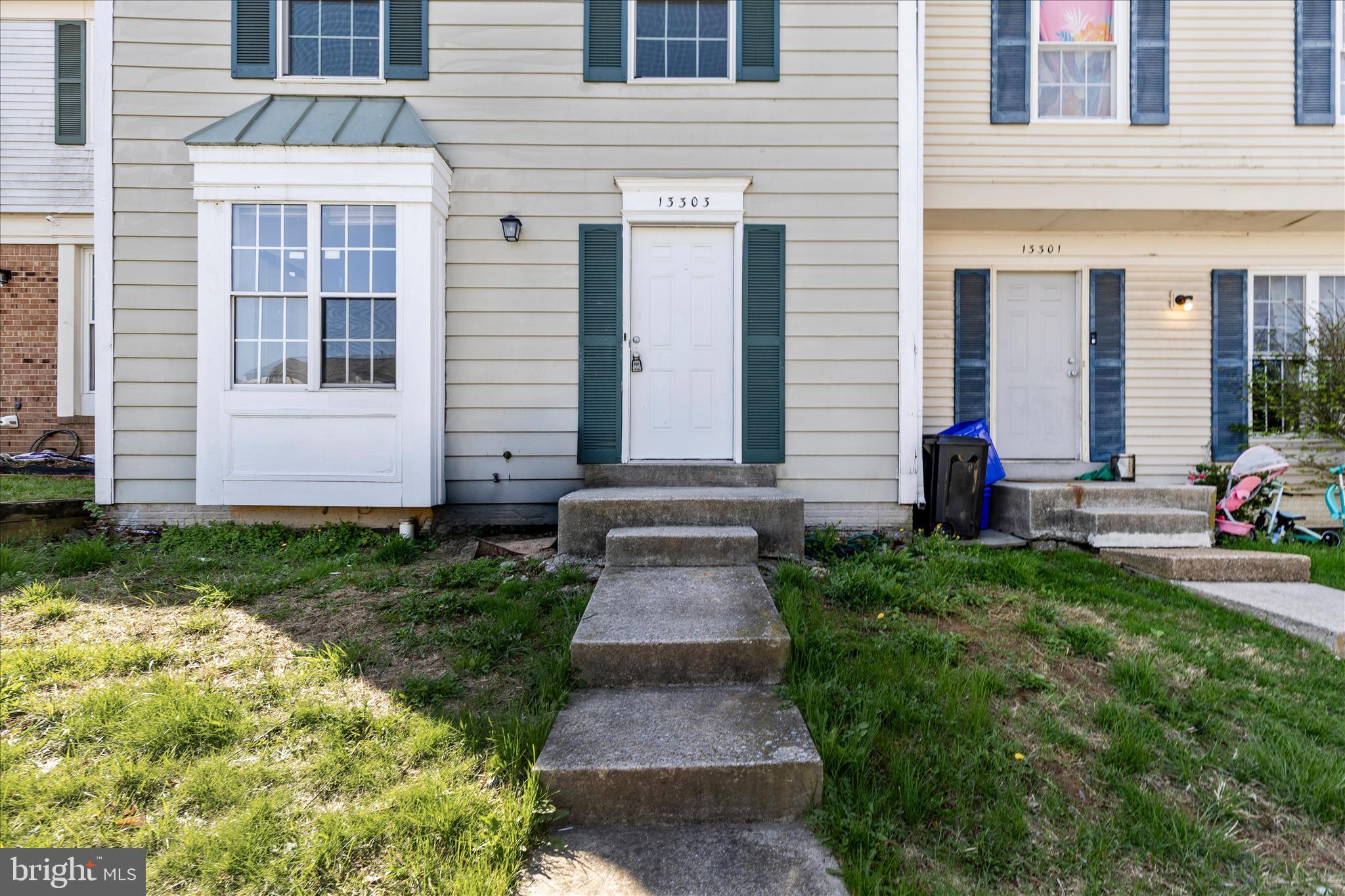 13303 Country Ridge Drive Germantown, MD 20874 - Photo 43 of 45 a front view of a house with garden