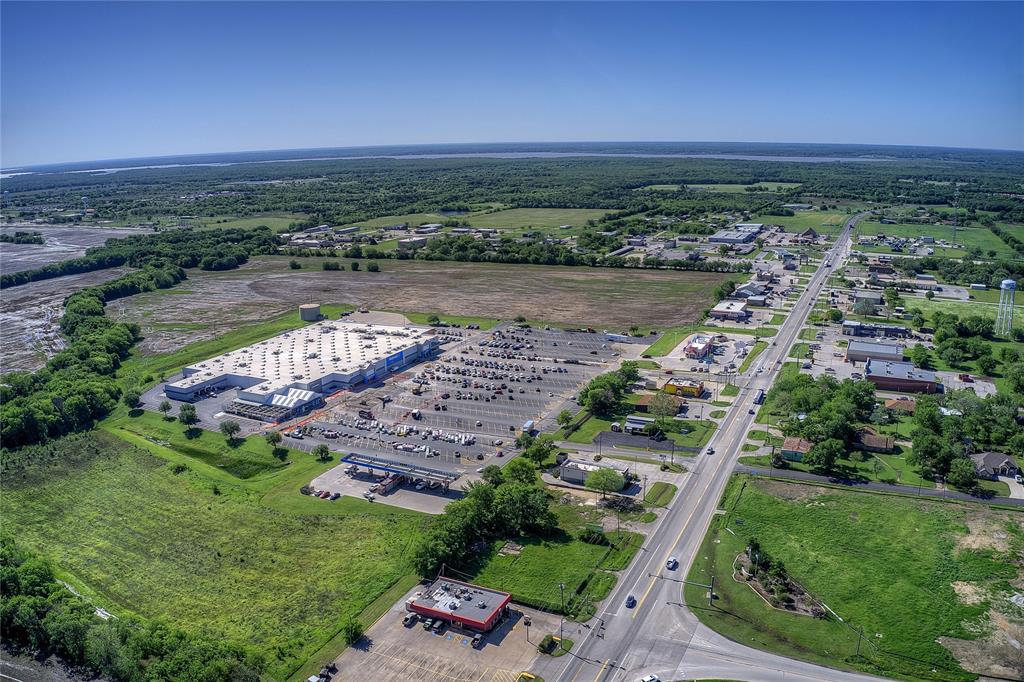 8782 Highway 34 Quinlan, TX 75474 - Photo 24 of 37 a view of a lake with a city