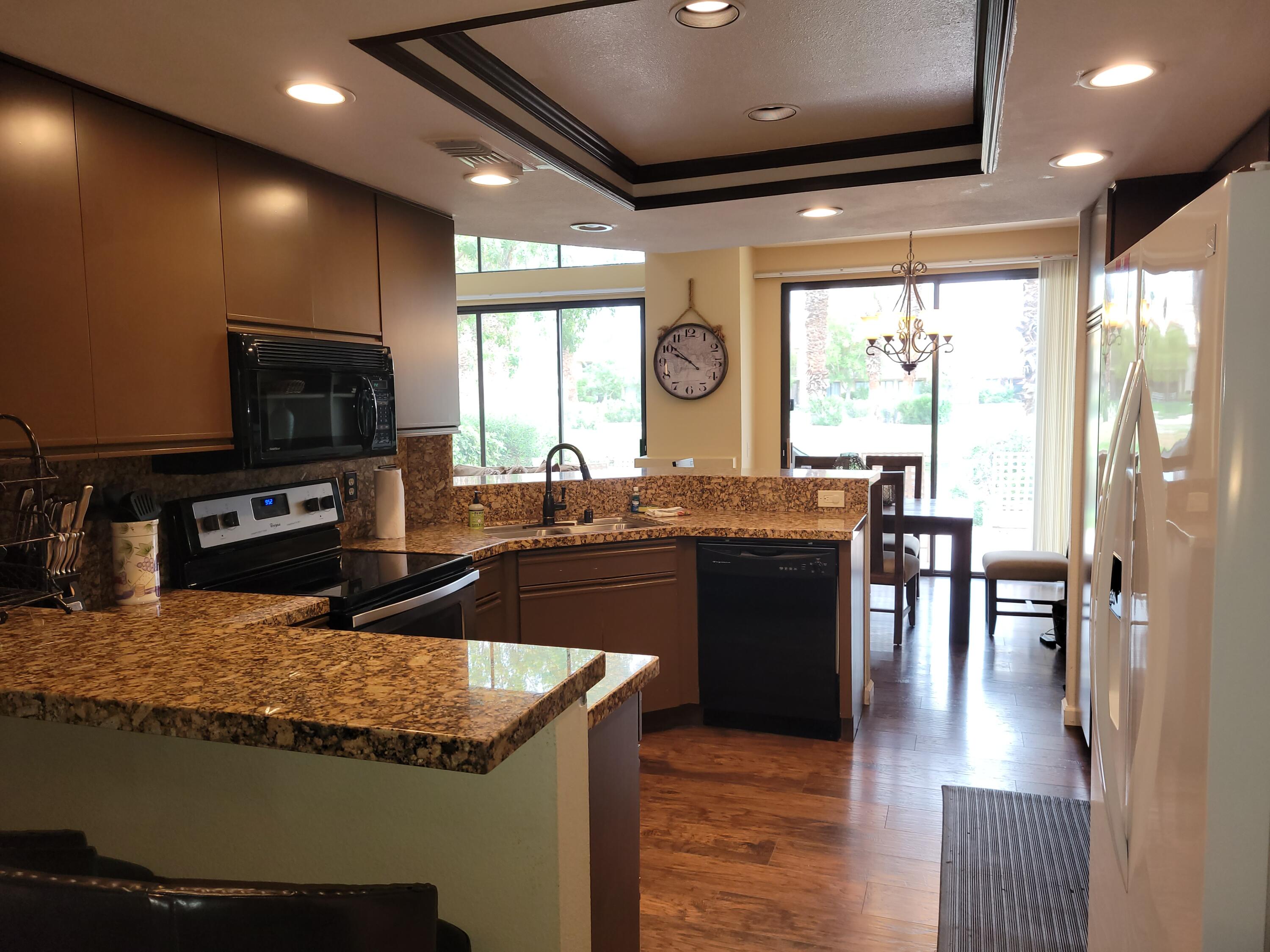 79738 Olympia Fields La Quinta, CA 92253 - Photo 7 of 50 Kitchen from TV Room