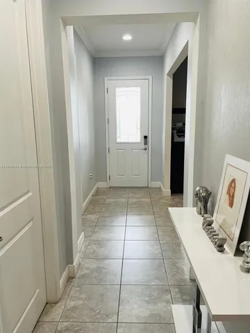 a white toilet sitting next to a bath tub