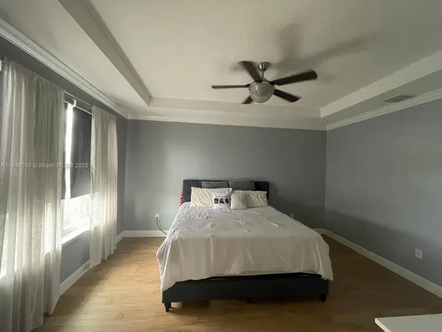 a view of a hallway with a door