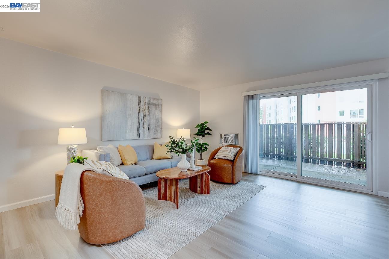 9005 Alcosta Boulevard, Unit 199 San Ramon, CA 94583 - Photo 11 of 57 a living room with furniture and wooden floor
