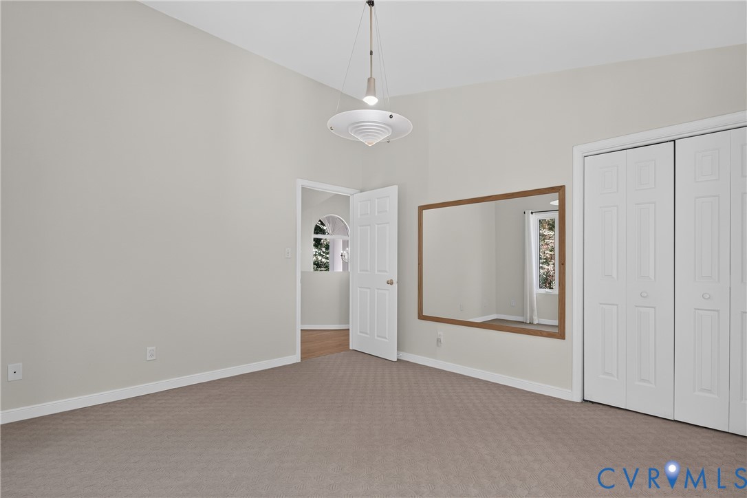 17089 Goshen Road Montpelier, VA 23192 - Photo 30 of 64 Spacious bedroom featuring neutral wall finishes,