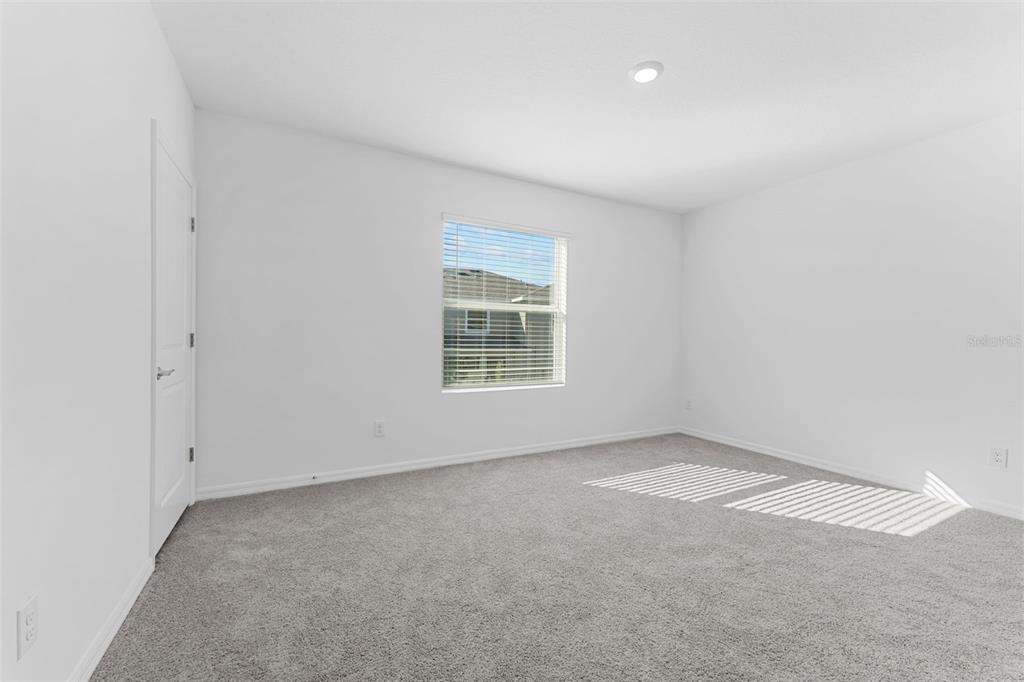 31336 Paper Birch Street Wesley Chapel, FL 33545 - Photo 11 of 38 an empty room with a window