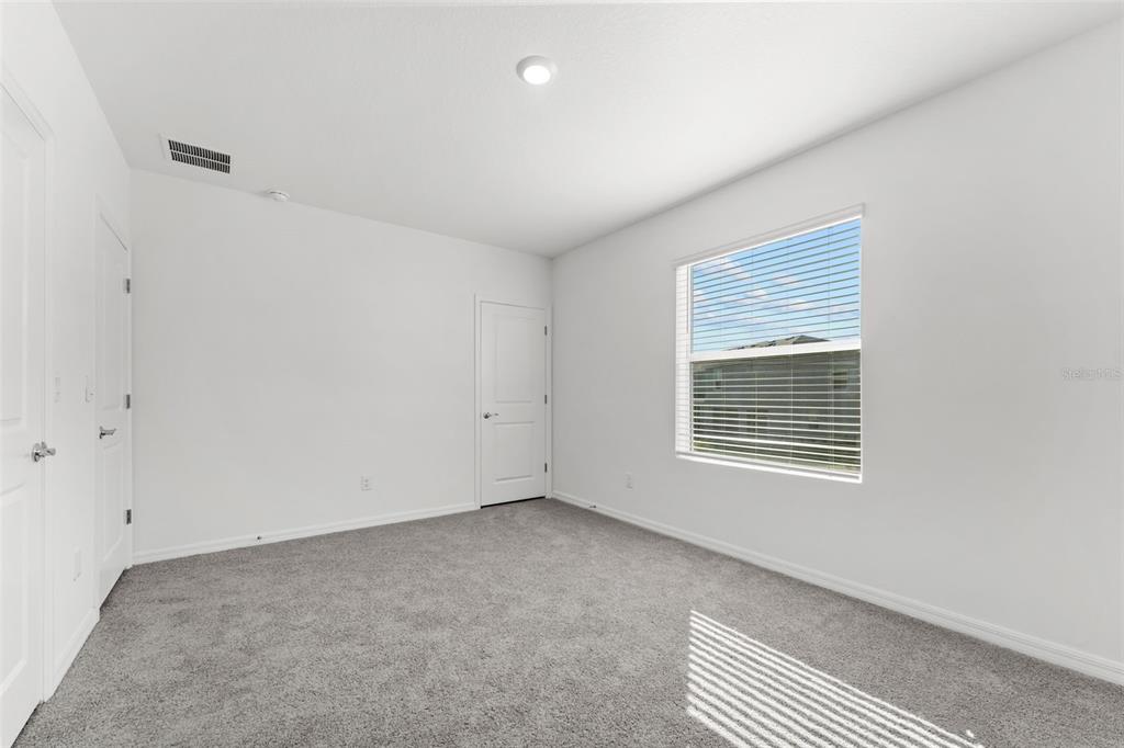 31336 Paper Birch Street Wesley Chapel, FL 33545 - Photo 12 of 38 an empty room with a window