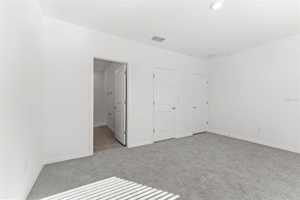31336 Paper Birch Street Wesley Chapel, FL 33545 - Photo 13 of 38 a view of an empty room