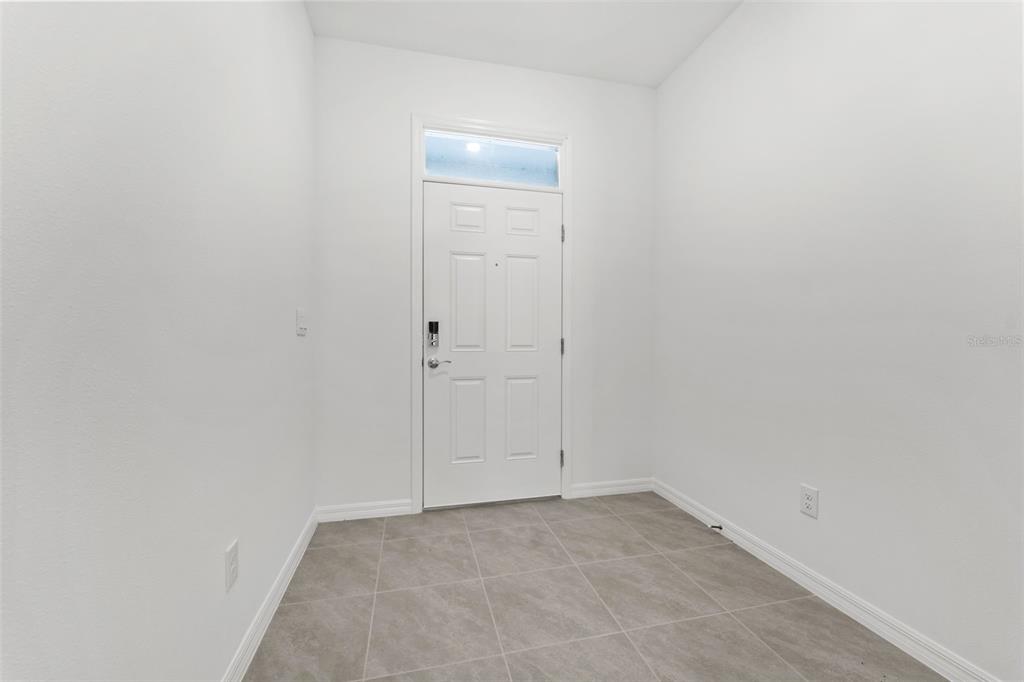 31336 Paper Birch Street Wesley Chapel, FL 33545 - Photo 3 of 38 a view of an empty room