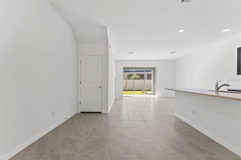 31336 Paper Birch Street Wesley Chapel, FL 33545 - Photo 5 of 38 a view of a kitchen with a sink and a window