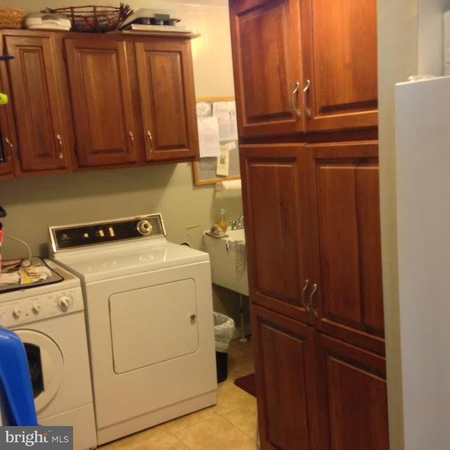 10805 River Road Denton, MD 21629 - Photo 18 of 29 Utility Room with Work Area Around the Corner