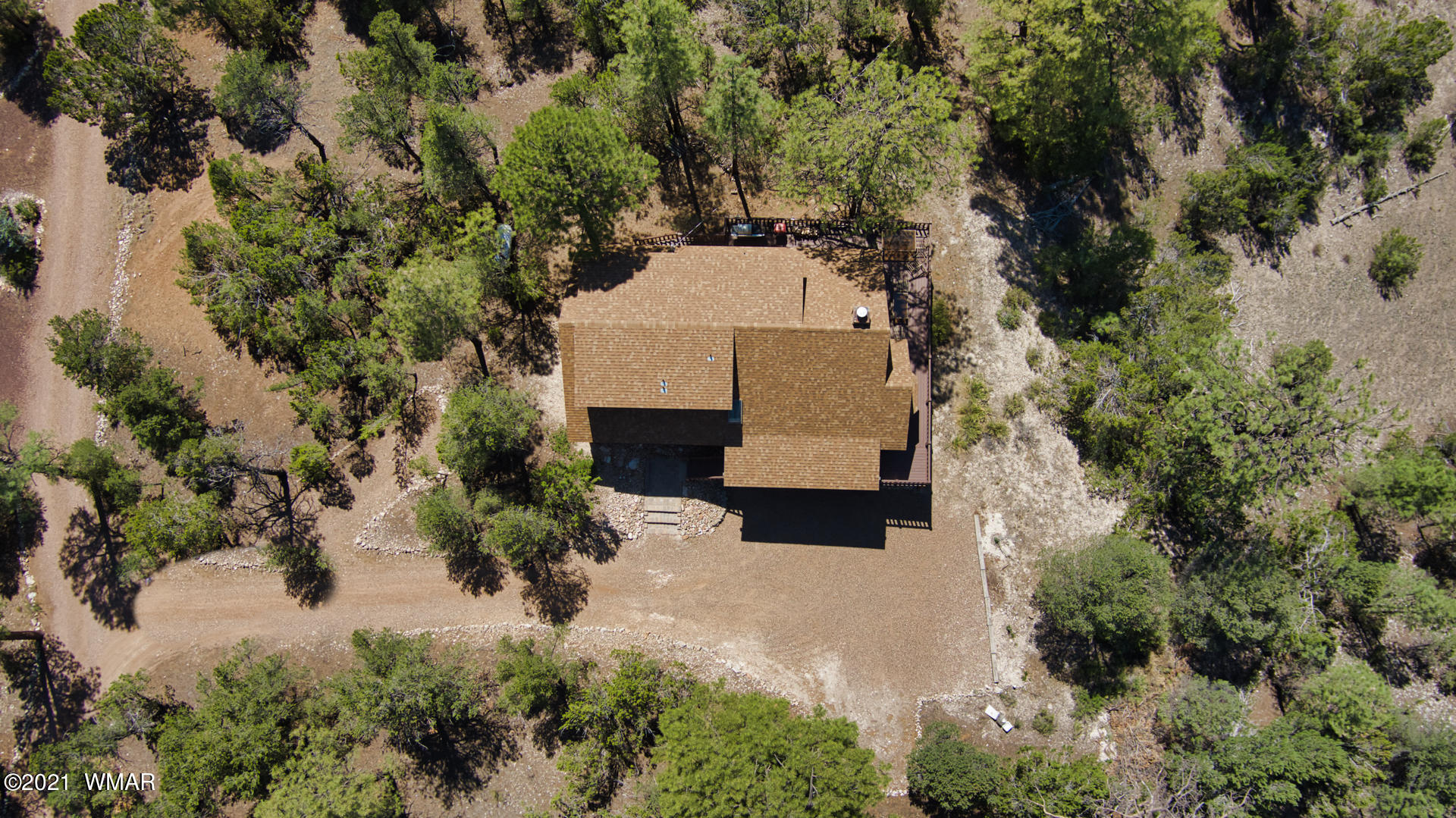 1910 Ridge Road Heber, AZ 85928 - Photo 12 of 39 an aerial view of a house with a yard and large trees